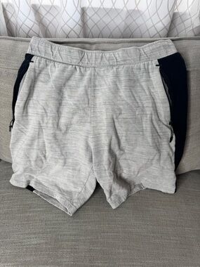 Light Gray Men's Performance Shorts with Black Zip Pockets